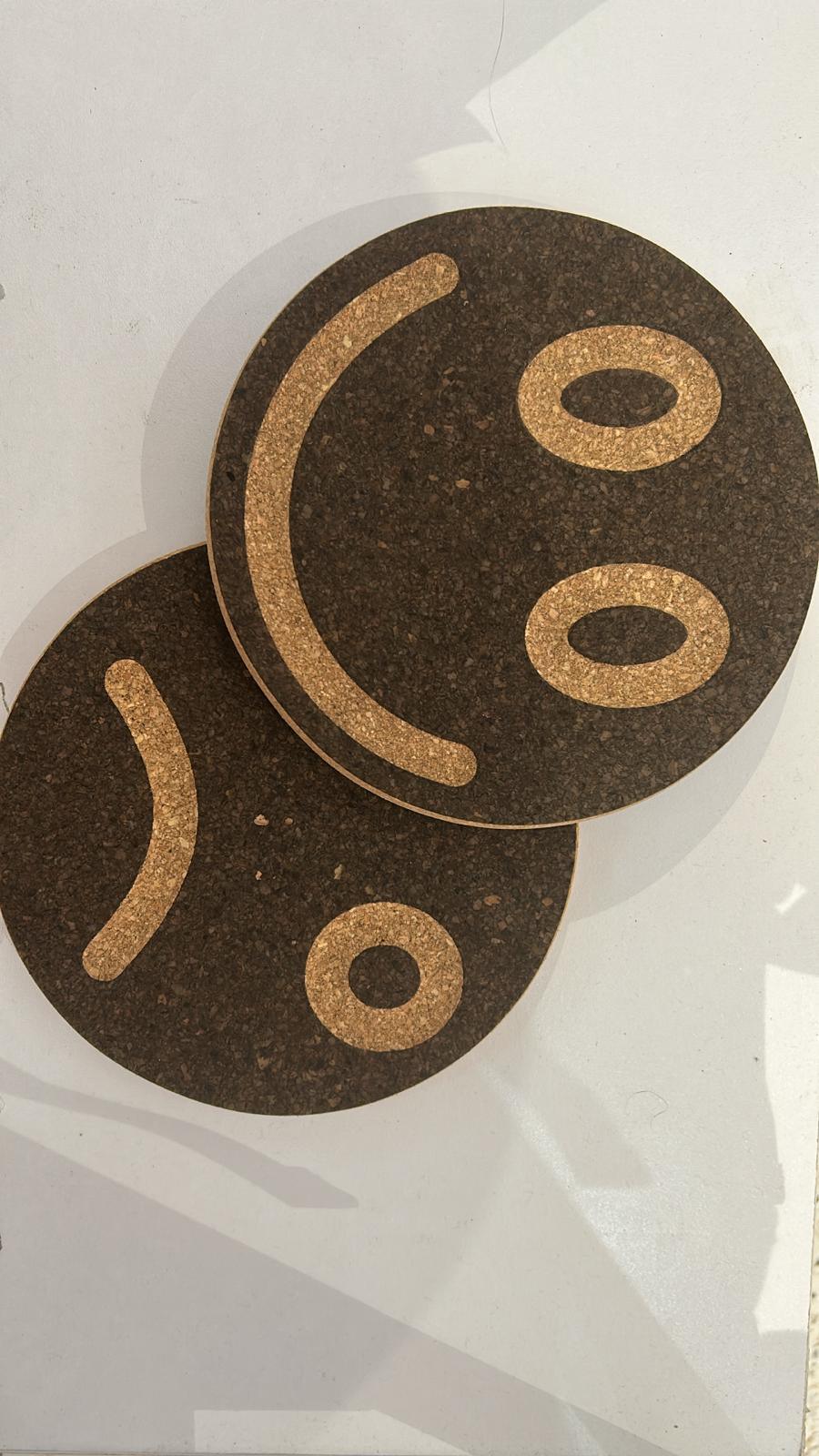 Happy/sad trivets - The Cork Shop