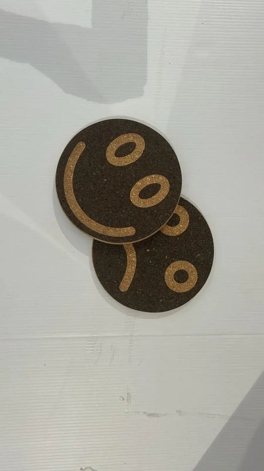 Happy/sad trivets - The Cork Shop